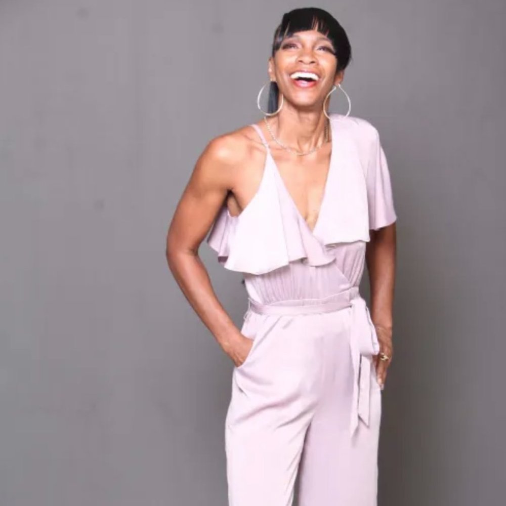 satin light colored jumpsuit